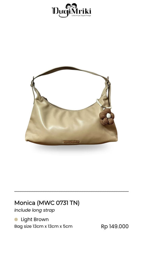 A light brown crescent-shaped shoulder bag with a long strap and a small flower charm, shown on a white background with product details below.