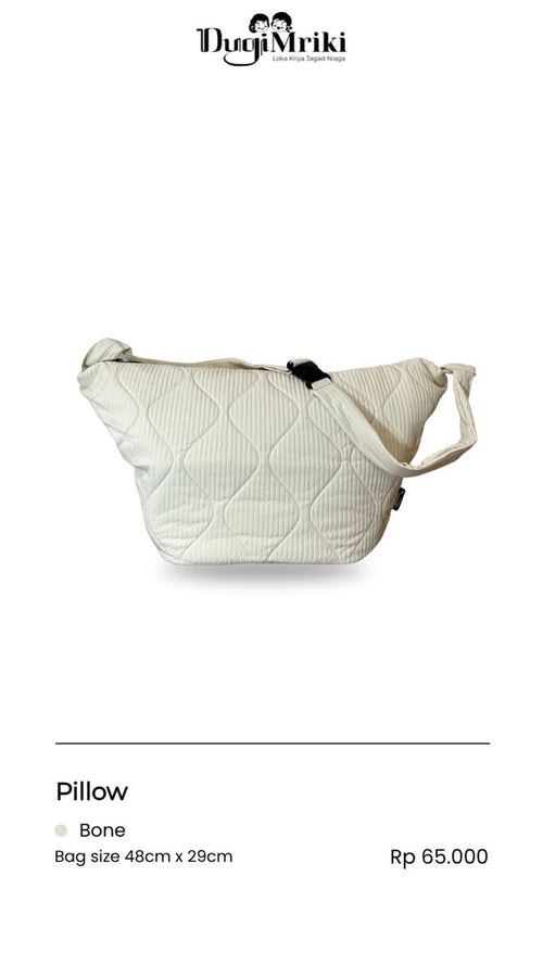 An off-white quilted shoulder bag with a diamond stitched pattern and a single strap, shown on a white background with product details below.